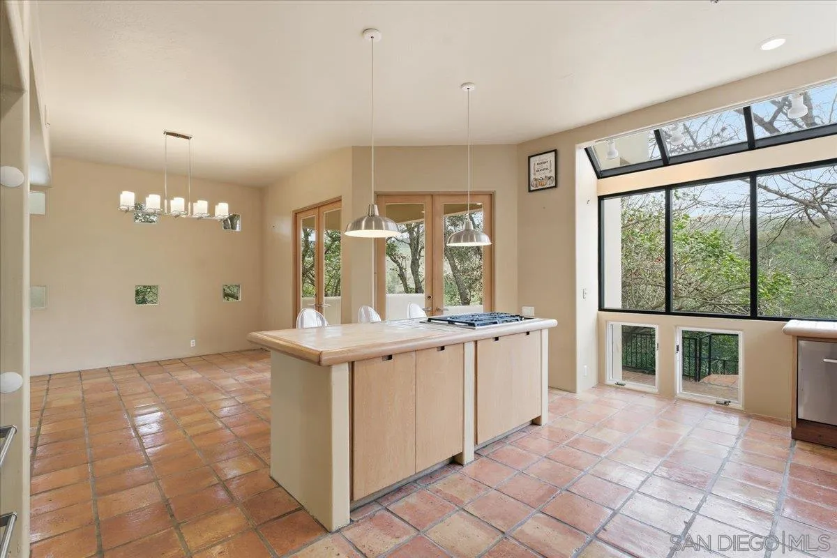 7030 Elfin Oaks Road Escondido, CA 92029 - Photo 8 of 36 a view of a kitchen with electric appliances