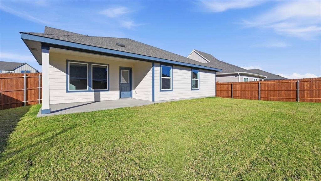 729 Lantana Lane Pilot Point, TX 76258 - Photo 16 of 19 a view of a house with backyard