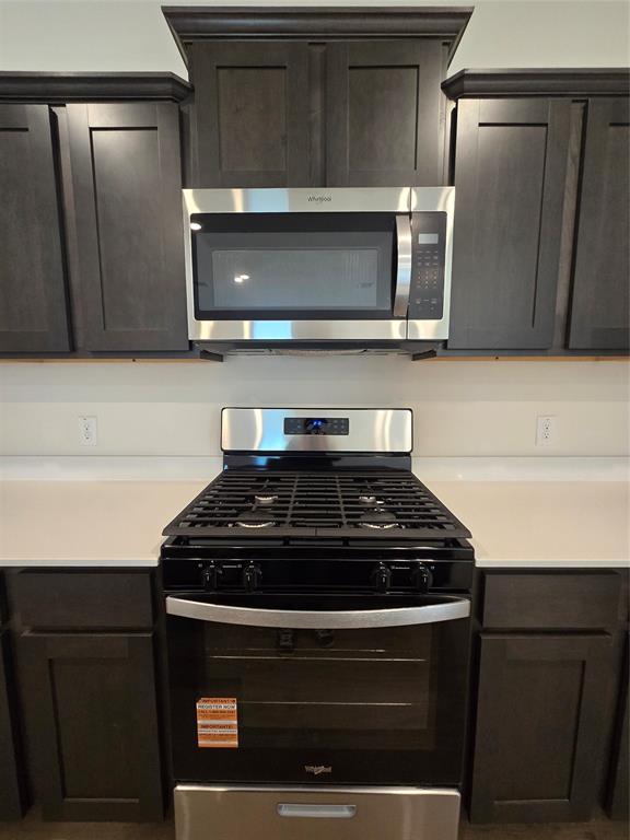 729 Lantana Lane Pilot Point, TX 76258 - Photo 4 of 19 a stove top oven sitting inside of a kitchen