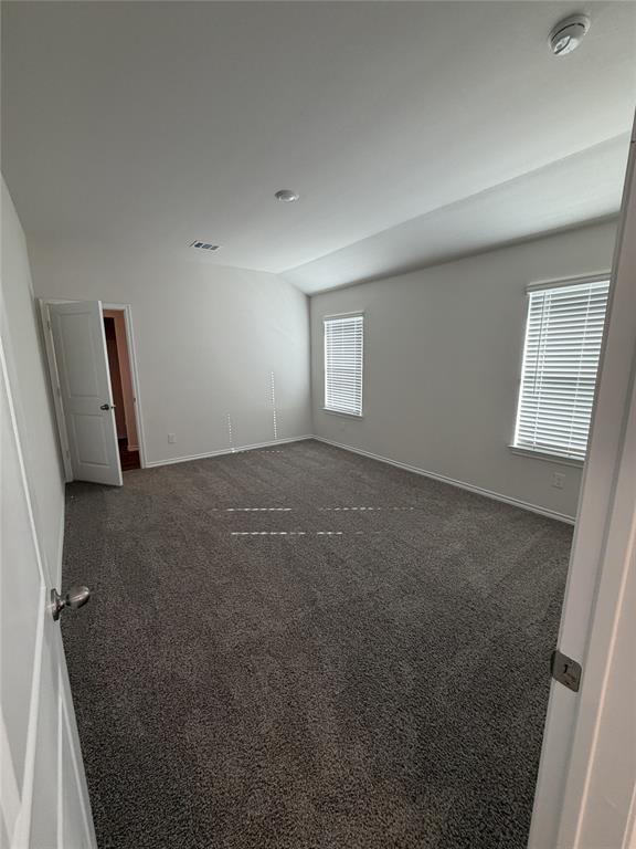 729 Lantana Lane Pilot Point, TX 76258 - Photo 7 of 19 a view of an empty room and a window