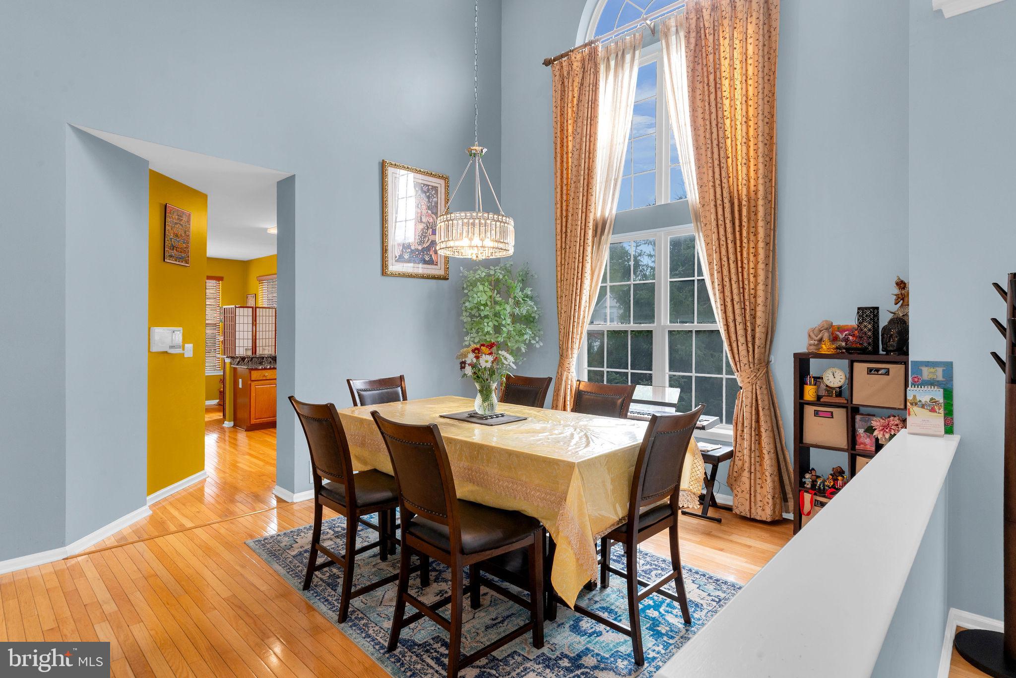 16 Cardiff Court Princeton Junction, NJ 08550 - Photo 12 of 60 a view of a dining room with furniture and a window