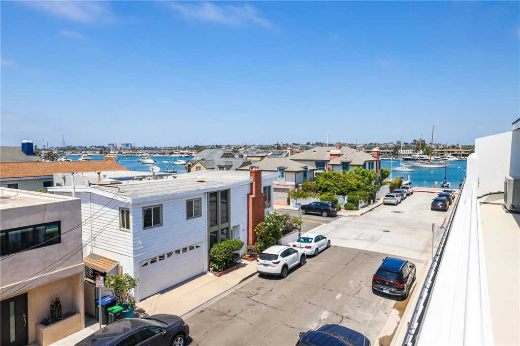 825 West Bay Avenue, Unit B Newport Beach, CA 92661 - Photo 21 of 30 an aerial view of a house with yard and mountain view in back