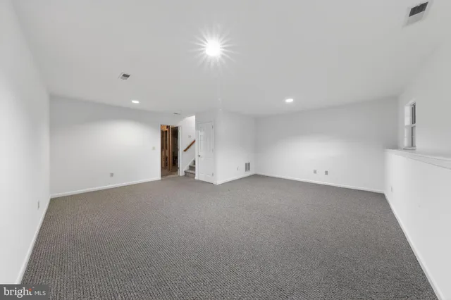 a view of a storage & utility room with washer and dryer