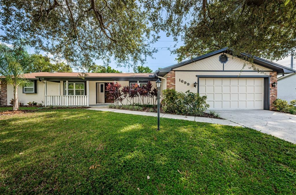 1699 Ashton Abbey Road Clearwater, FL 33755 - Photo 1 of 1 Great Location on the Dunedin line and Dunedin schools. 3/2/2 Furnished Pool Home 2,517 sq. ft on a private lot over 1/4 acre of land. Bike to Clearwater Beach or Honeymoon Island, walk or bike to Edgewater Park, Pinellas Trail, Downtown Dunedin with shoppes, restaurants, events and marina. No HOA or flood insurance.