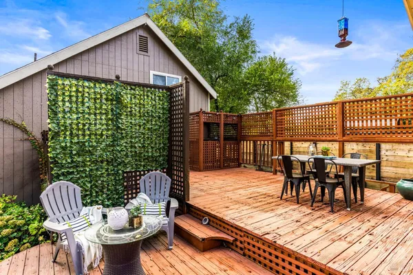 a outdoor dining space with furniture and outdoor seating