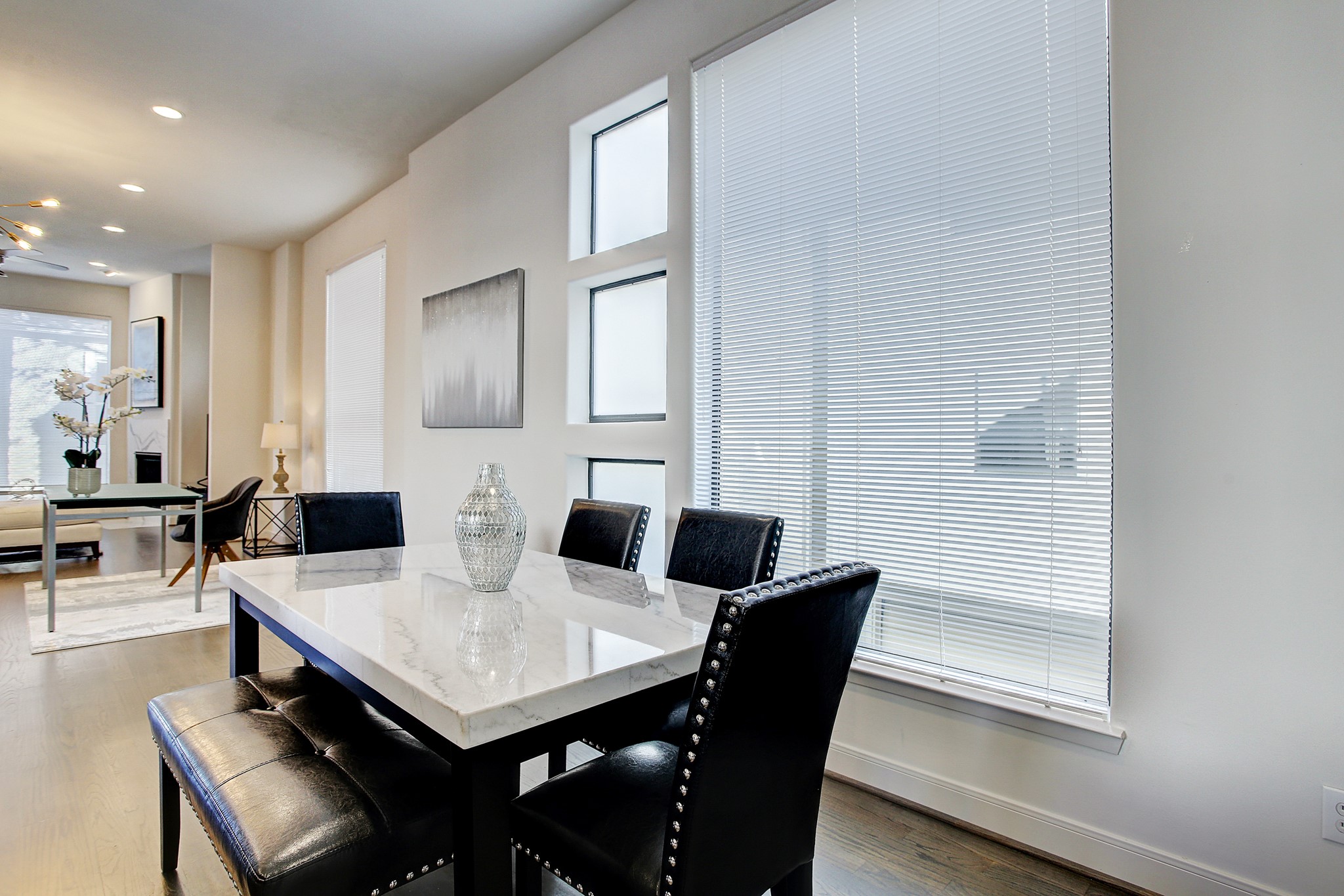 902 Roy Street Houston, TX 77007 - Photo 8 of 47 a view of a dining room with furniture and wooden floor