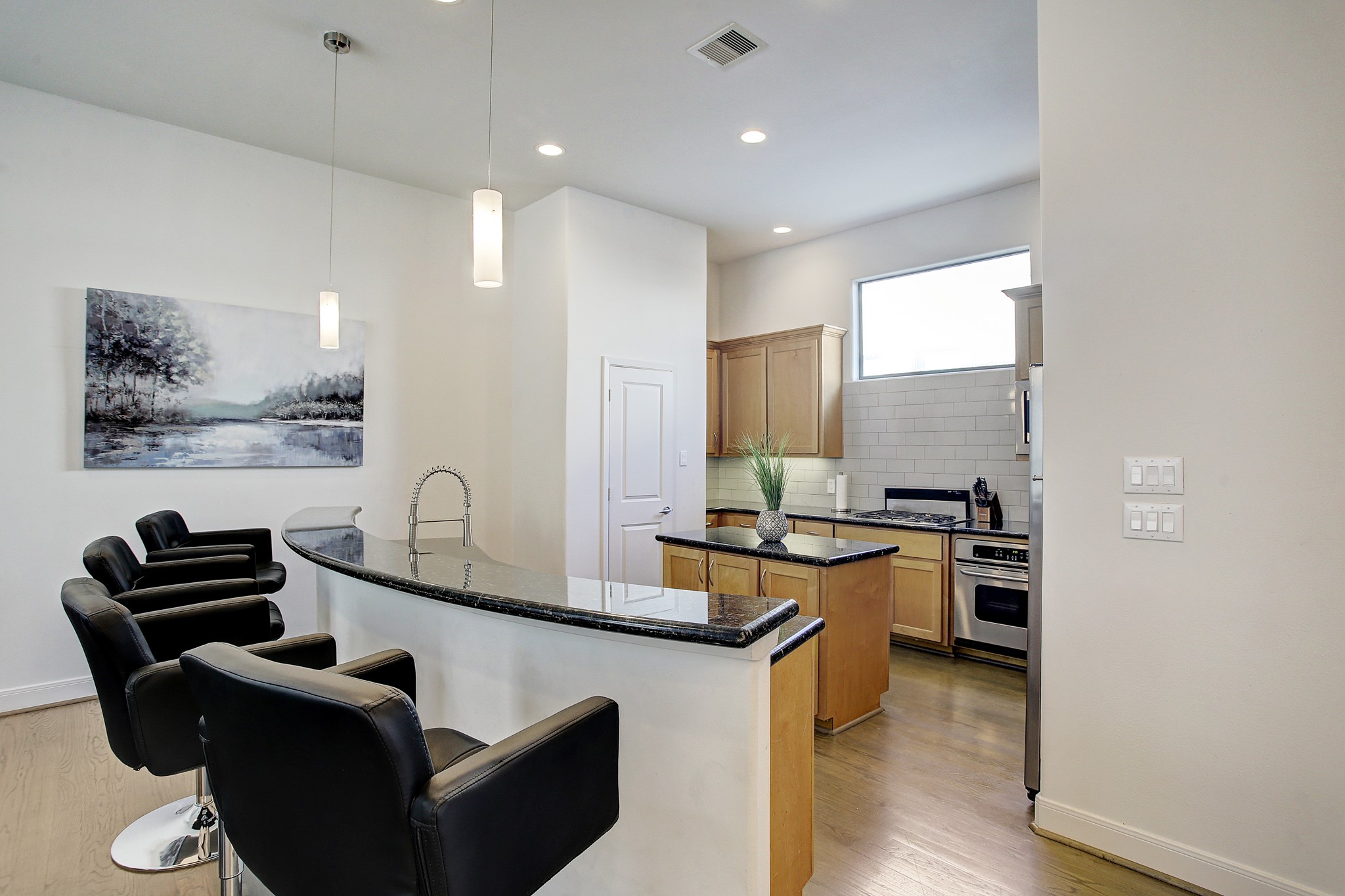 902 Roy Street Houston, TX 77007 - Photo 9 of 47 a kitchen with a sink stove and refrigerator