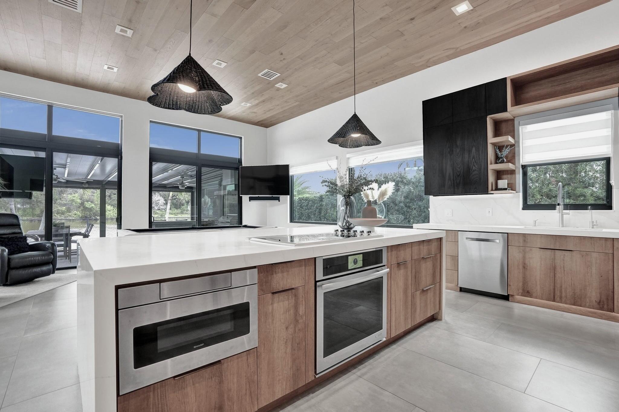 3222 Ridge Trace Davie, FL 33328 - Photo 17 of 77 a kitchen with a stove and a sink