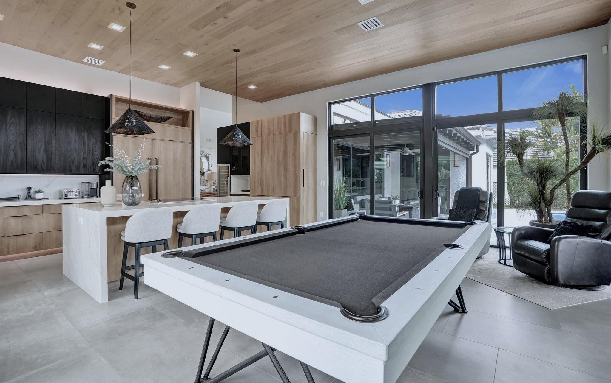 3222 Ridge Trace Davie, FL 33328 - Photo 26 of 77 a living room with stainless steel appliances granite countertop furniture a sink a counter top and a view of living room