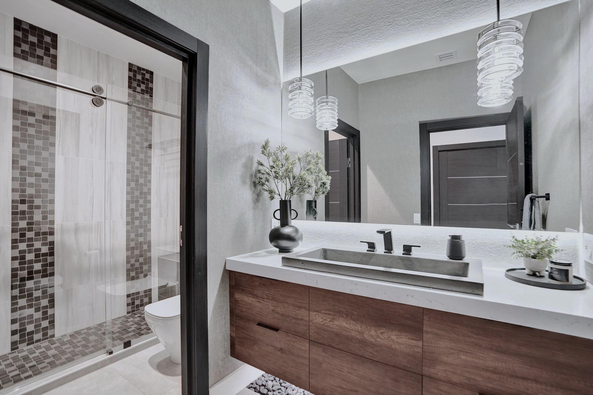 3222 Ridge Trace Davie, FL 33328 - Photo 27 of 77 a bathroom with a sink and a mirror