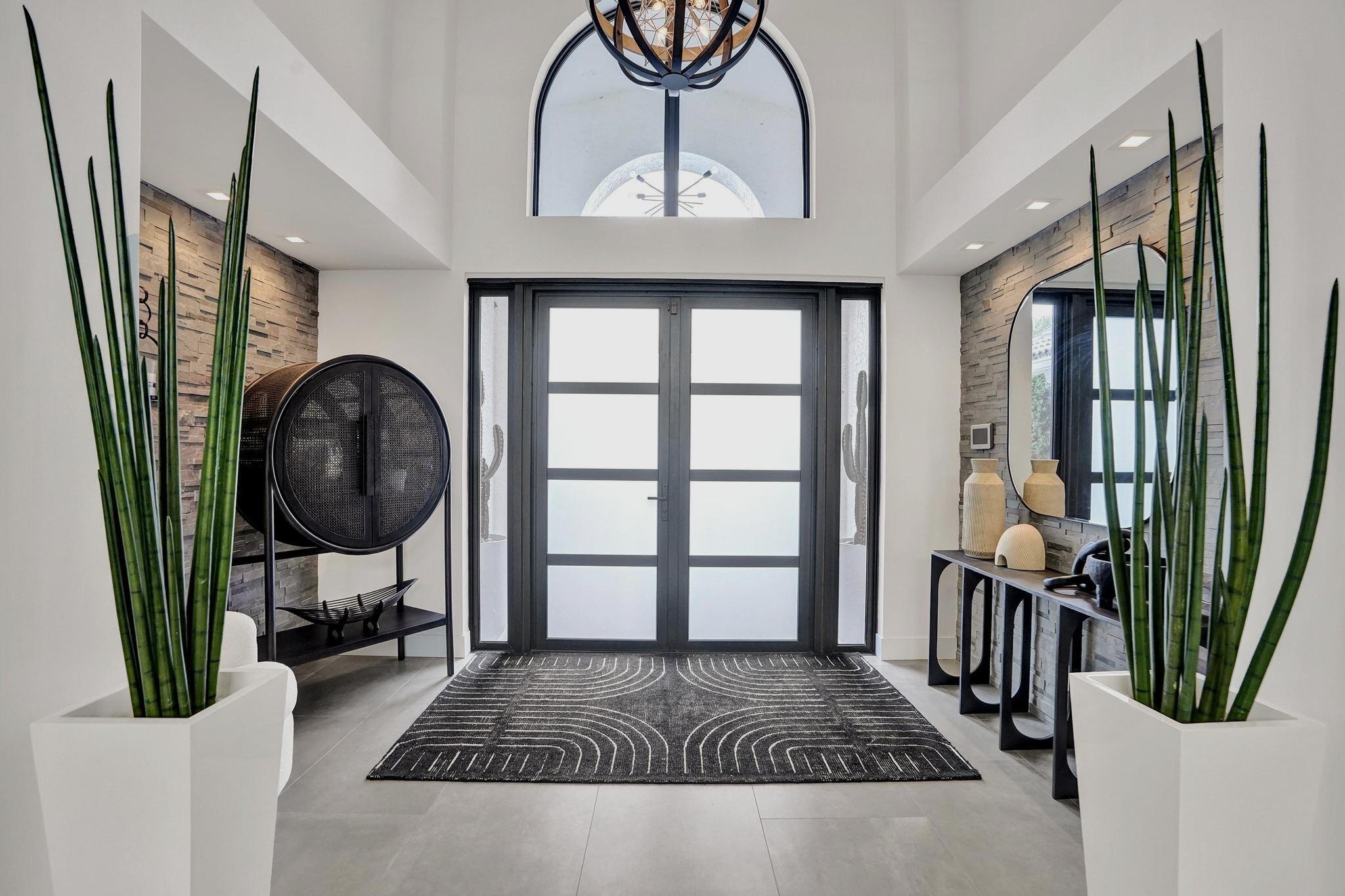 3222 Ridge Trace Davie, FL 33328 - Photo 9 of 77 a view of entryway and hall with wooden floor