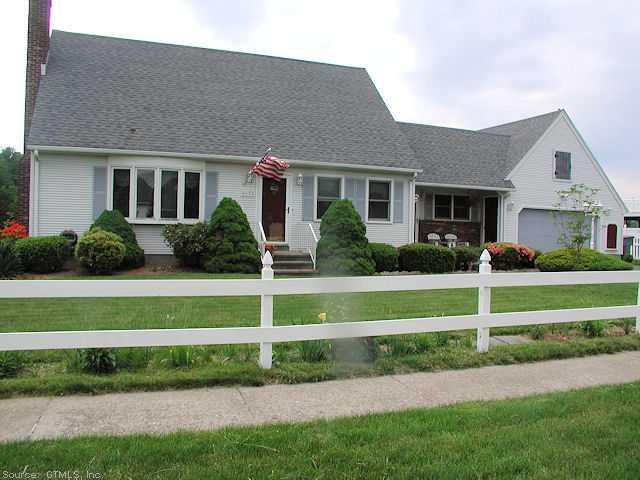 48 Spruceland Road Enfield, CT 06082 - Photo 1 of 1 a front view of a house with a yard