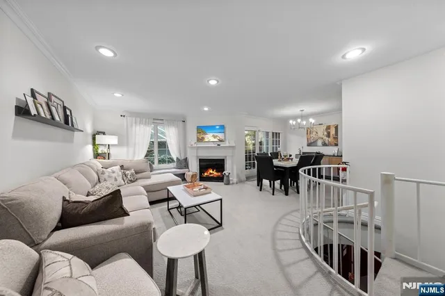 a living room with furniture and a table