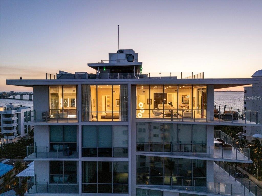 111 Golden Gate Point, Unit 802PH Sarasota, FL 34236 - Photo 18 of 55 a view of a city from a balcony