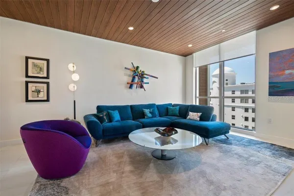 a view of a living room and dining room