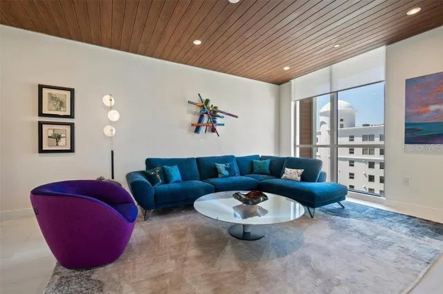 a view of a living room and dining room