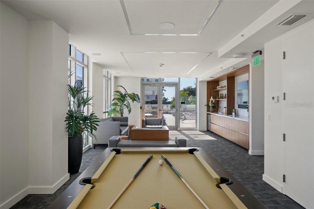111 Golden Gate Point, Unit 802PH Sarasota, FL 34236 - Photo 44 of 55 a view of a living room and dining room