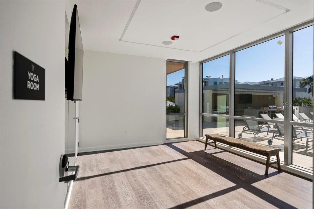111 Golden Gate Point, Unit 802PH Sarasota, FL 34236 - Photo 46 of 55 a living room with furniture