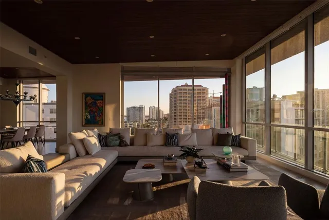 a kitchen with stainless steel appliances a refrigerator and cabinets