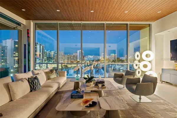 a outdoor living space with furniture and city view