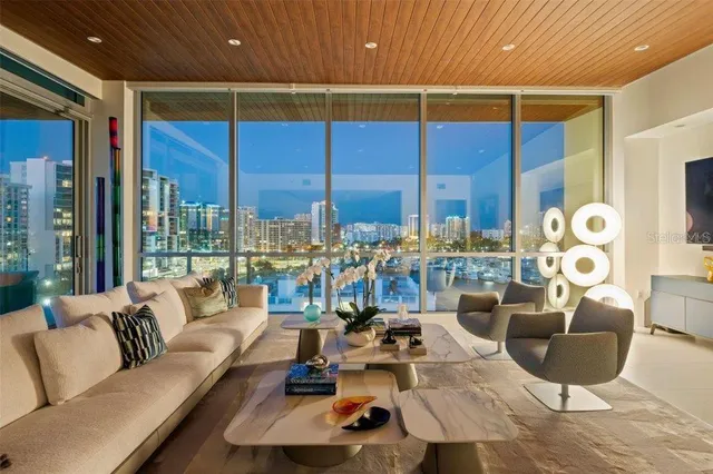 a outdoor living space with furniture and city view