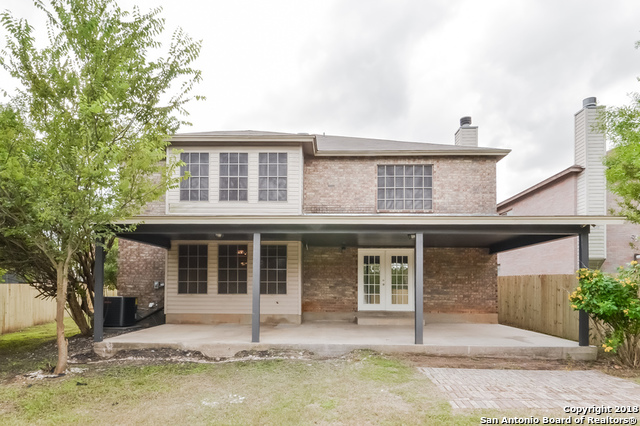 8423 Manderly Place Converse, TX 78109 - Photo 9 of 10 front view of a house with a yard