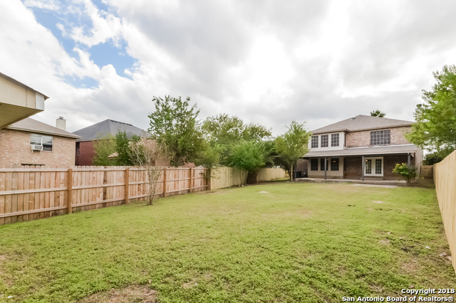 8423 Manderly Place Converse, TX 78109 - Photo 10 of 10 a view of a house with a yard and sitting area