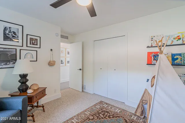 a workspace with furniture and window