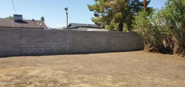 a swimming pool with a yard