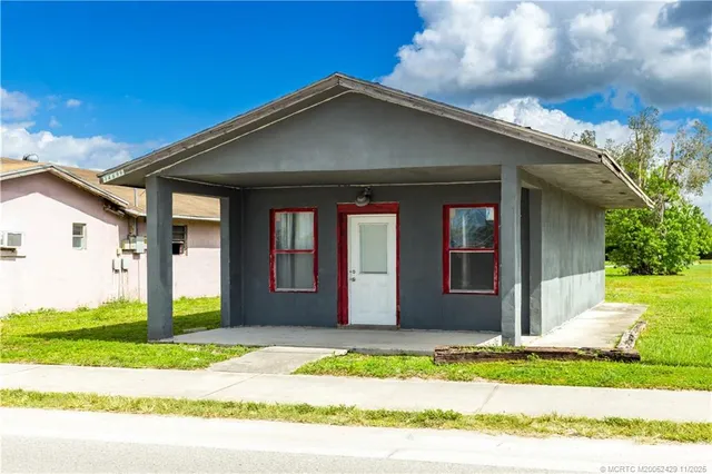 a bathroom with a glass door shower