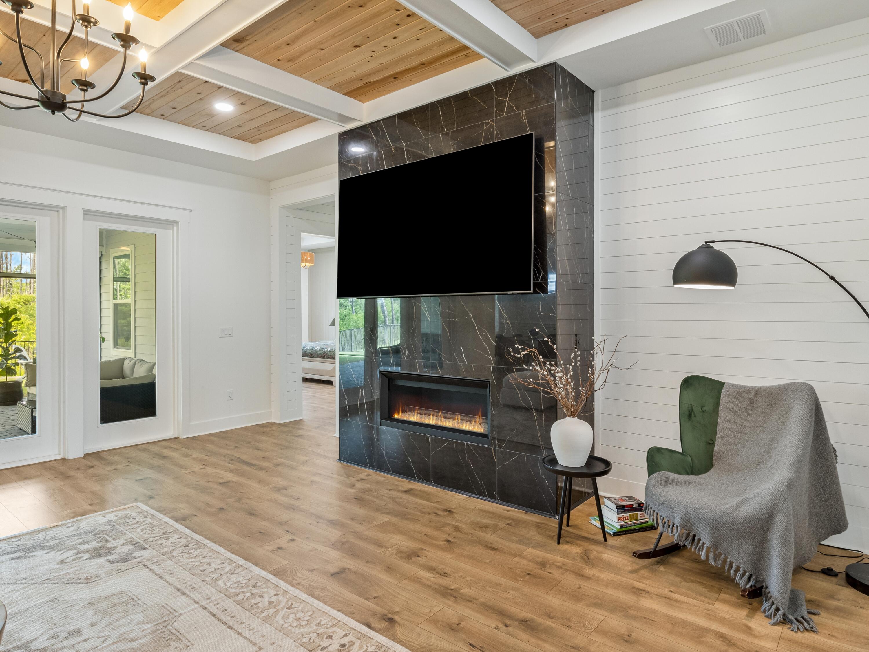 298 Lafayette Road Watersound, FL 32461 - Photo 11 of 76 a living room with furniture and a flat screen tv