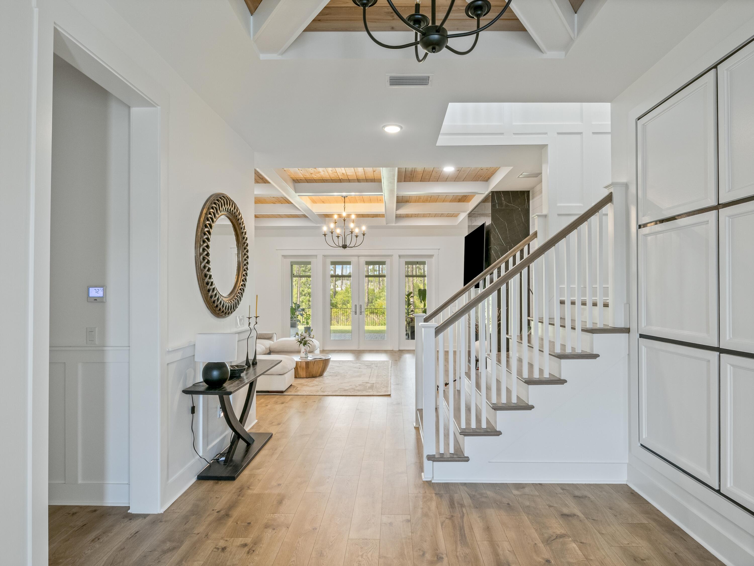 298 Lafayette Road Watersound, FL 32461 - Photo 3 of 76 a view of entryway and hall with wooden floor