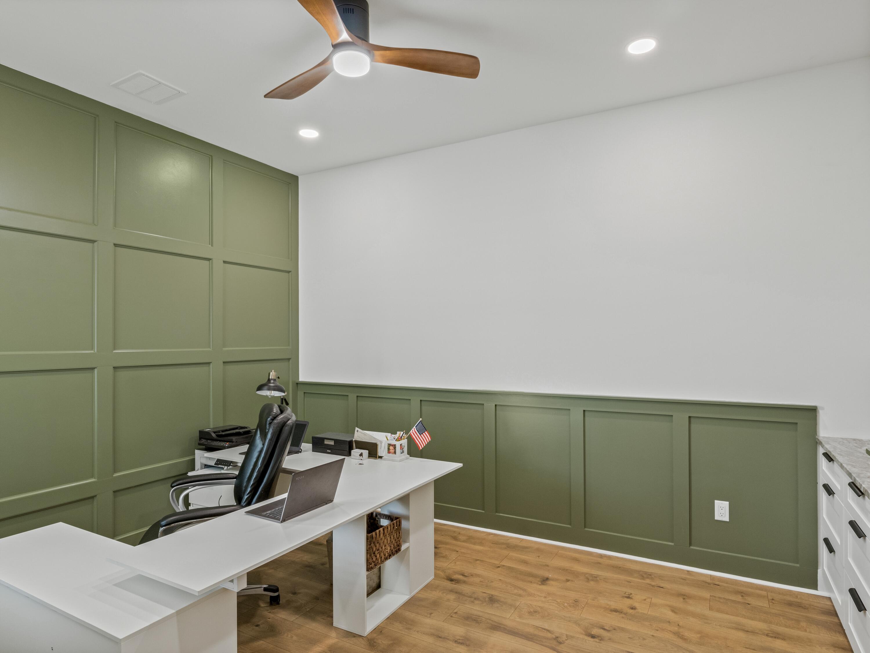 298 Lafayette Road Watersound, FL 32461 - Photo 4 of 76 a bathroom with a sink and a mirror