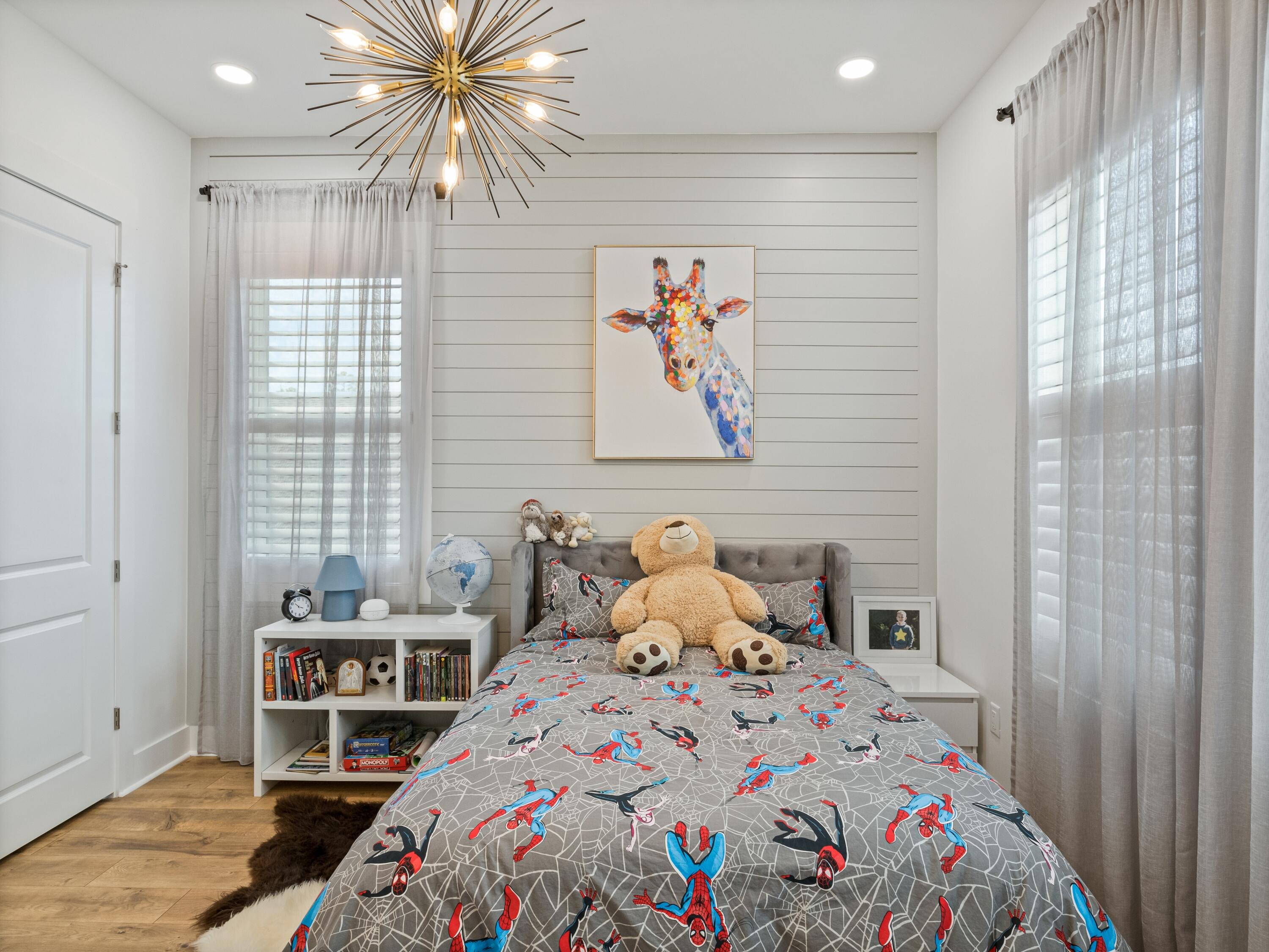 298 Lafayette Road Watersound, FL 32461 - Photo 49 of 76 a bedroom with a bed and a window