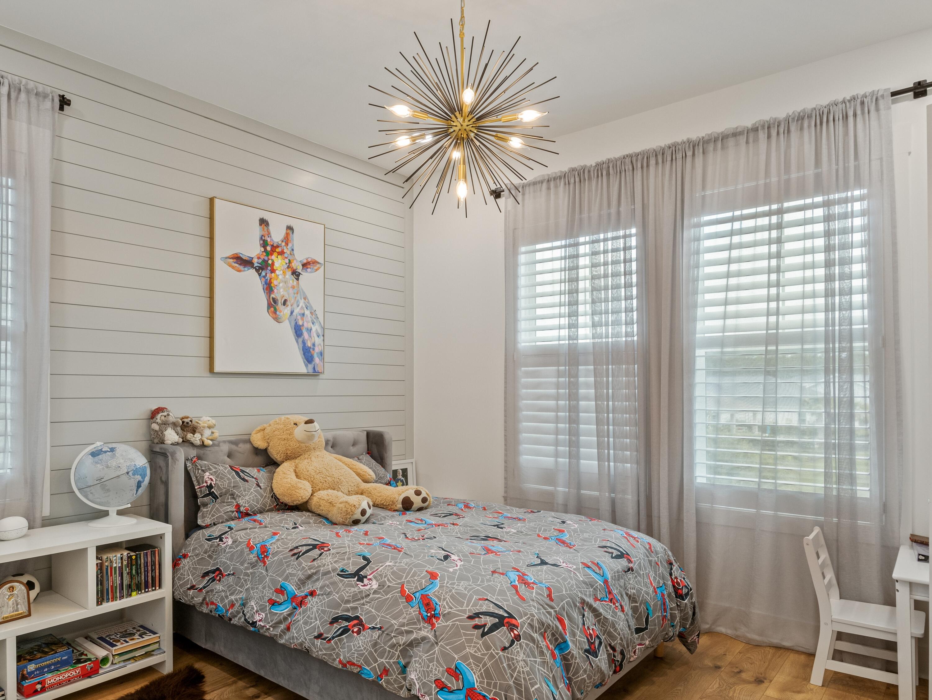 298 Lafayette Road Watersound, FL 32461 - Photo 50 of 76 a bedroom that has a bed and a large window