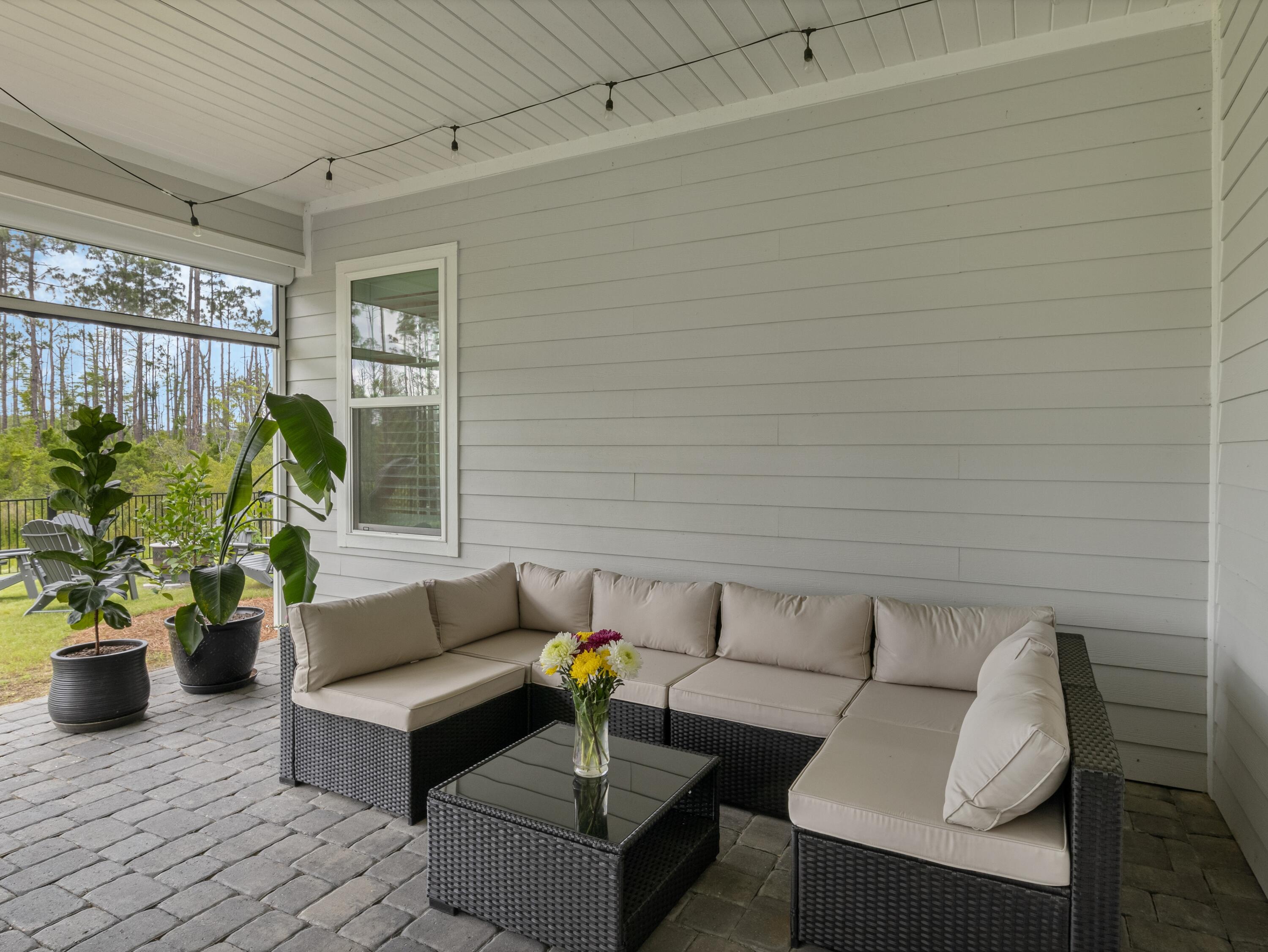 298 Lafayette Road Watersound, FL 32461 - Photo 59 of 76 a building outdoor space with patio furniture