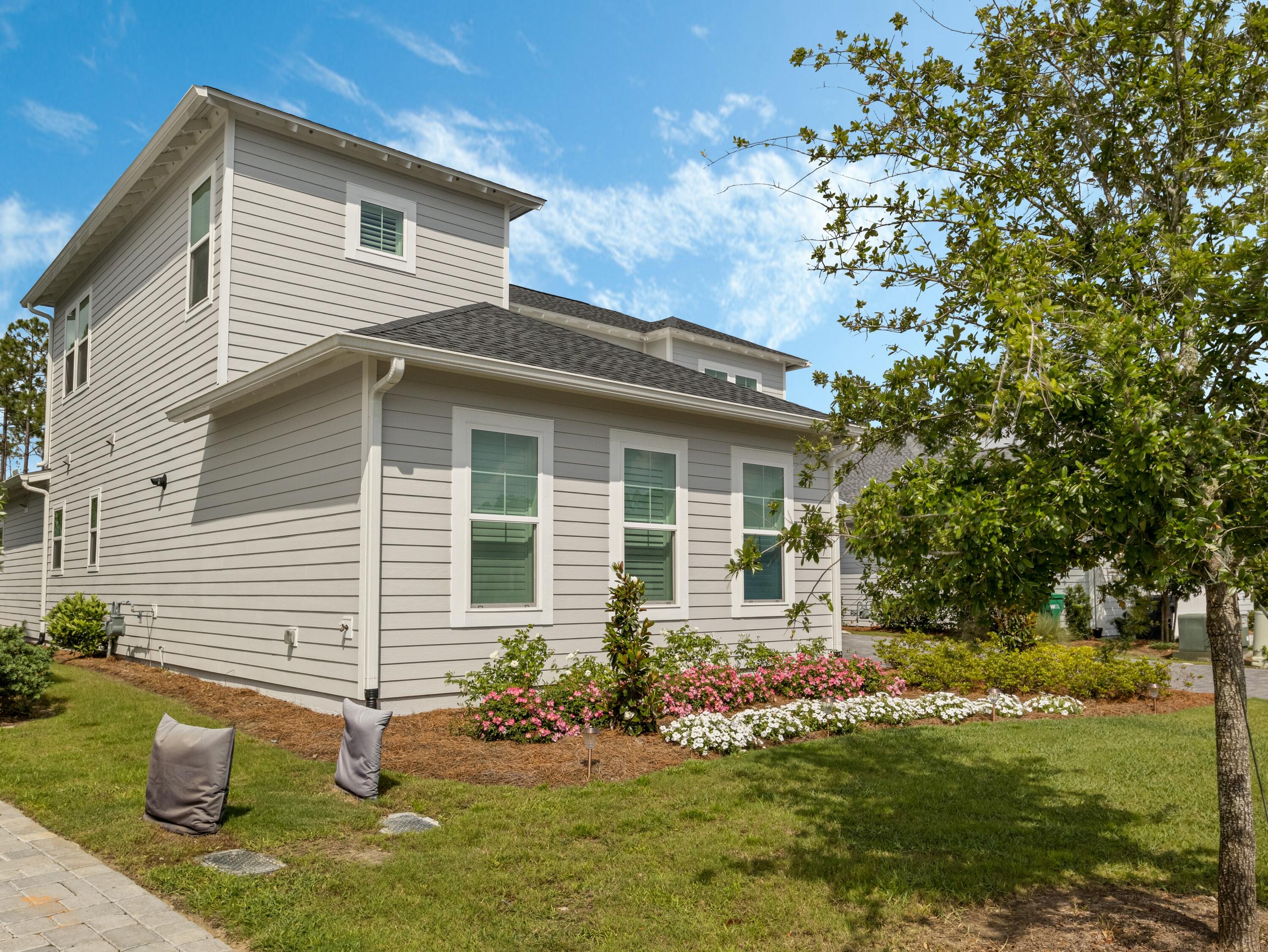 298 Lafayette Road Watersound, FL 32461 - Photo 73 of 76 a front view of a house with a yard