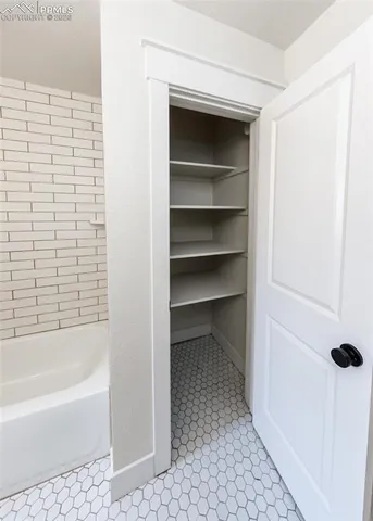 a bathroom with a bathtub