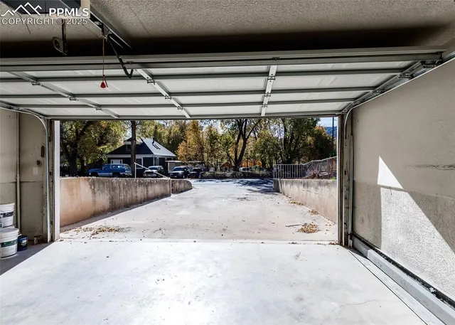 a view of a house with a snow in the yard