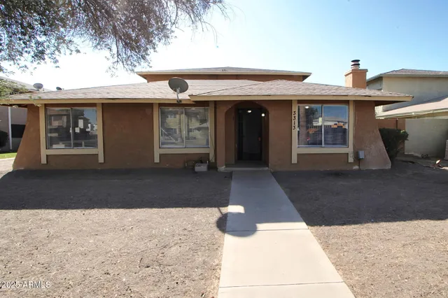 a view of a house with a patio
