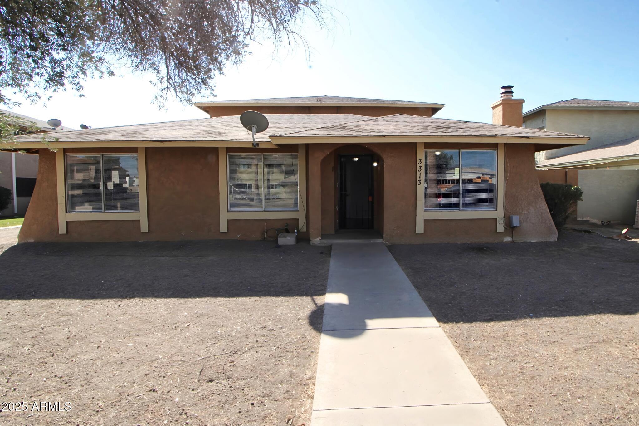 a view of a house with a patio