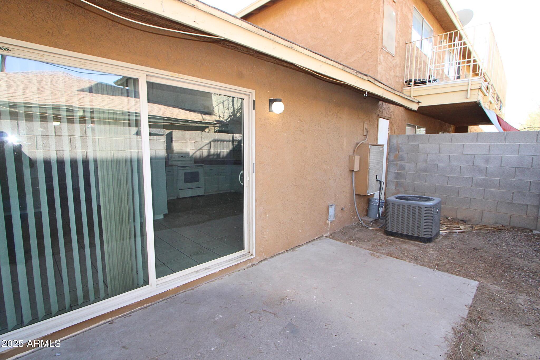 3313 West Harmont Drive, Unit 1 Phoenix, AZ 85051 - Photo 7 of 16 a view of a outdoor space with street view