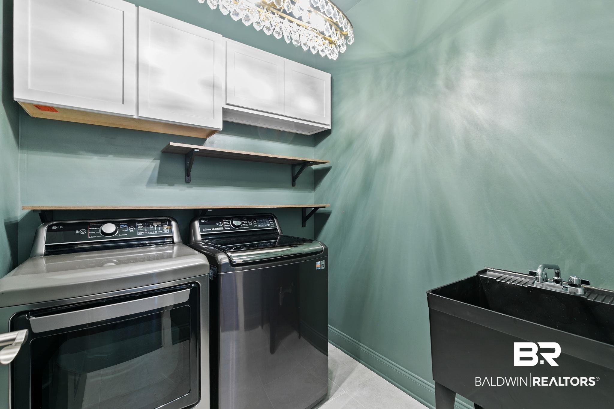 31654 Canopy Loop Daphne, AL 36527 - Photo 44 of 64 Laundry area with washer and dryer, cabinet space, and suspended lighting