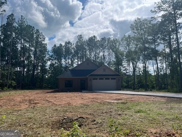 a house view with swimming pool in front of it