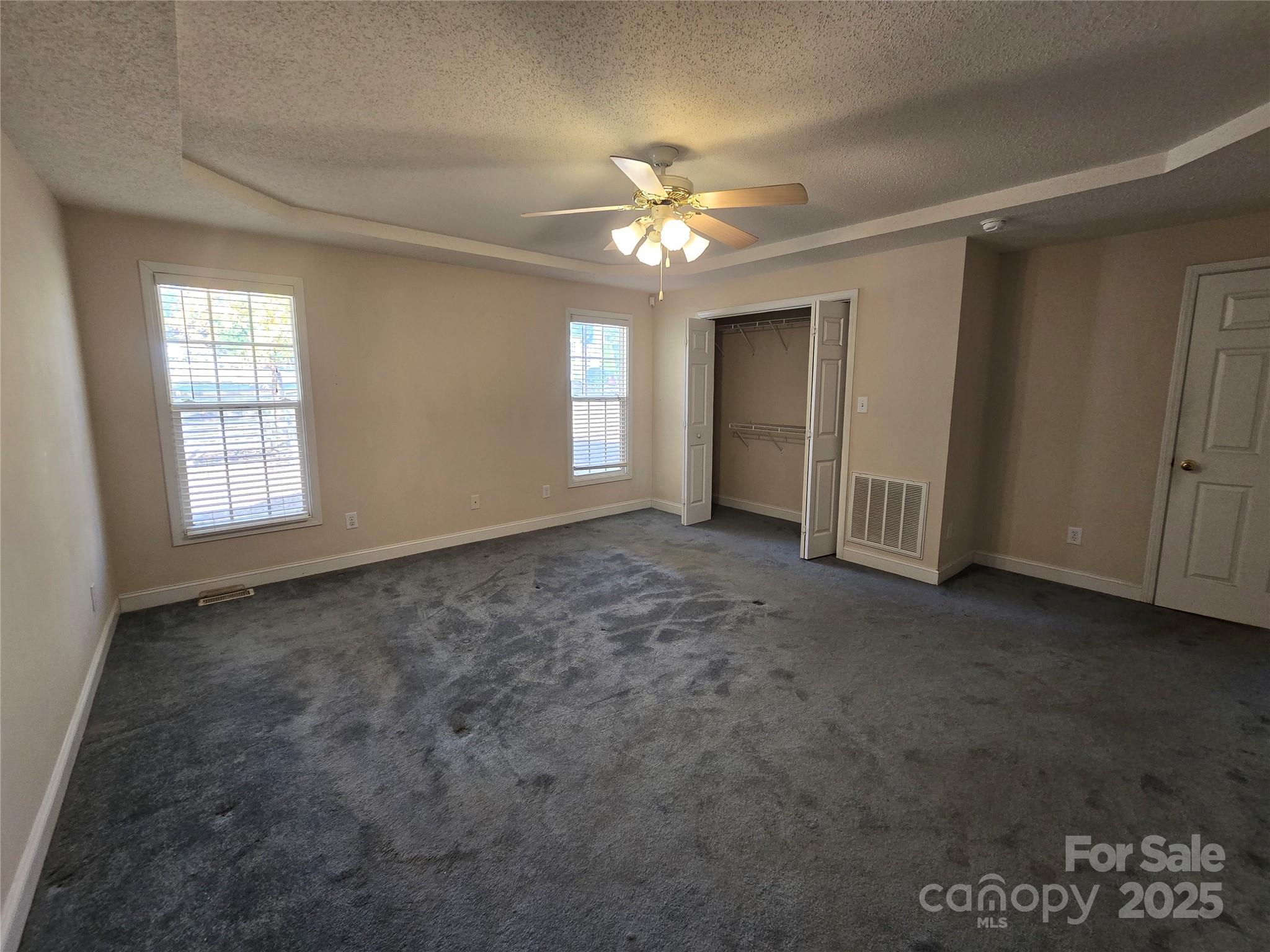 462 Cress Loop Road Salisbury, NC 28147 - Photo 18 of 48 wooden floor in an empty room with a window