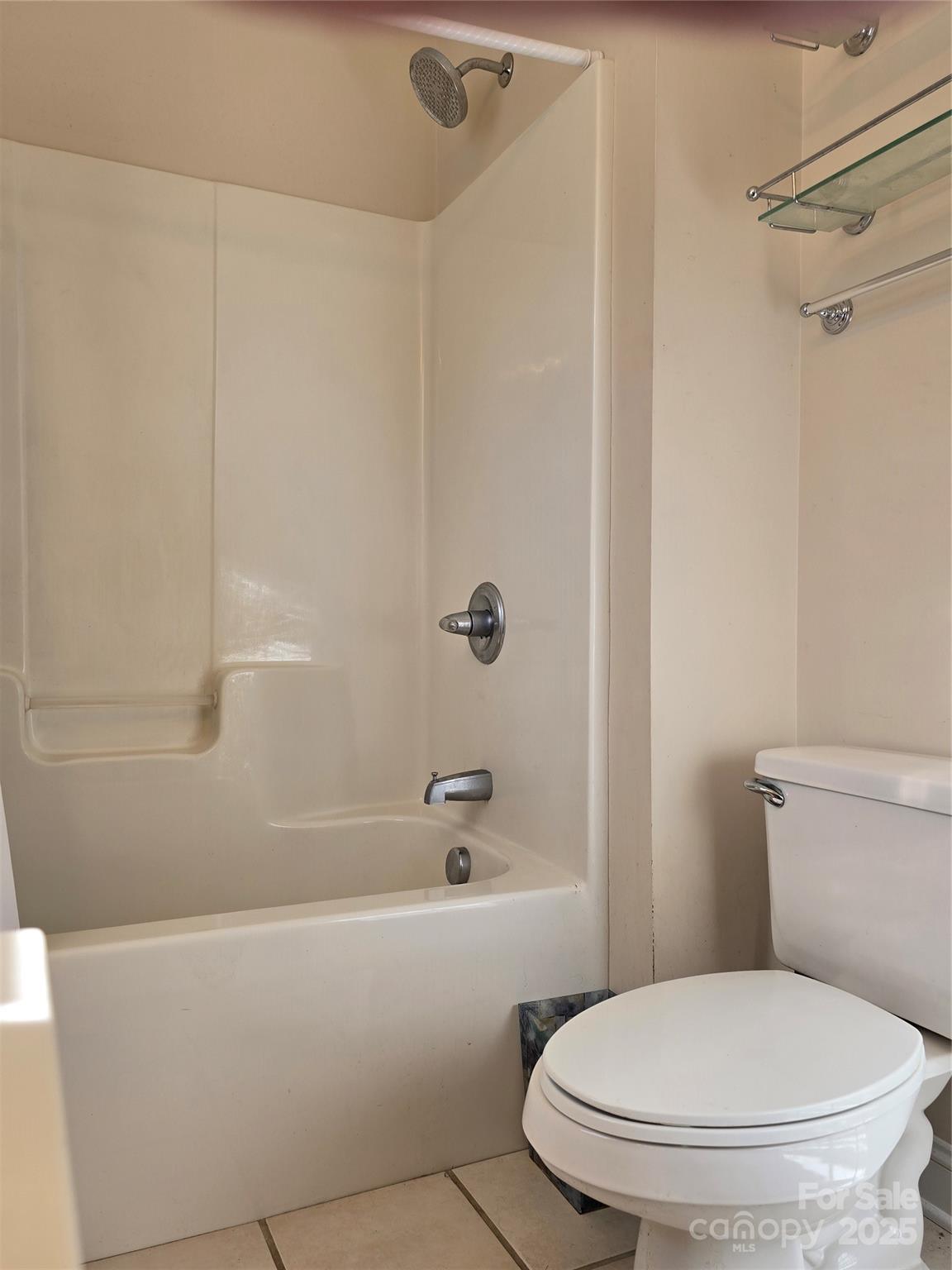 462 Cress Loop Road Salisbury, NC 28147 - Photo 29 of 48 a white toilet sitting next to a bath tub and a shower