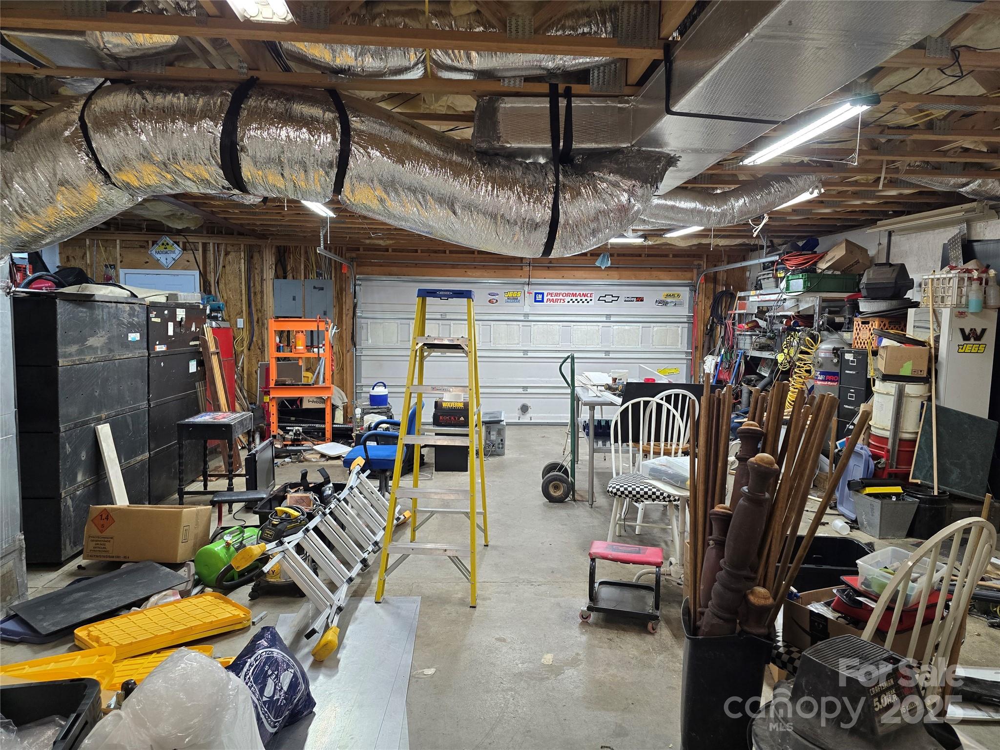 462 Cress Loop Road Salisbury, NC 28147 - Photo 33 of 48 a view of a room with gym equipment