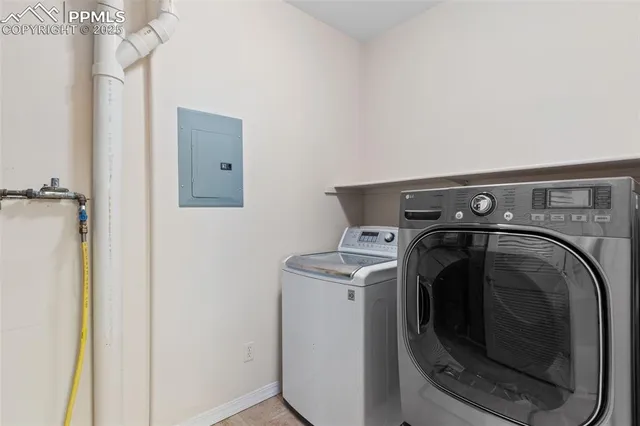a utility room with dryer and washer