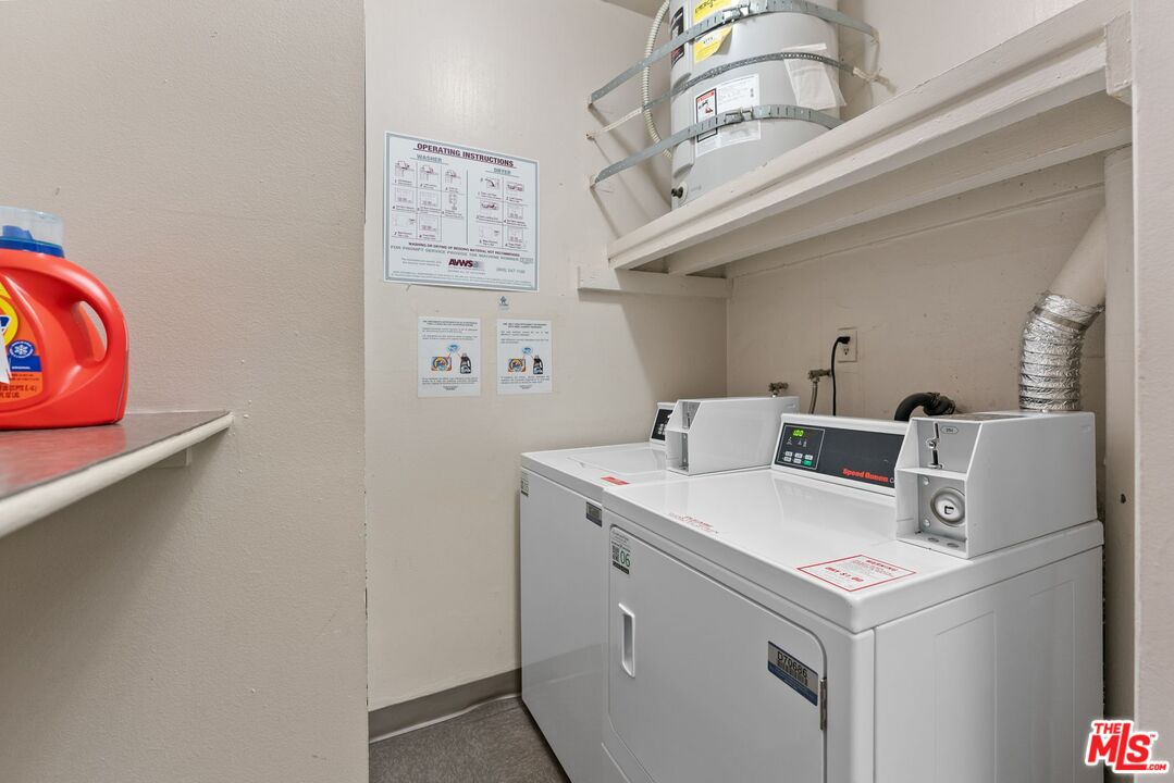 612 South Barrington Avenue, Unit 317 Los Angeles, CA 90049 - Photo 9 of 17 a utility room with dryer and washer