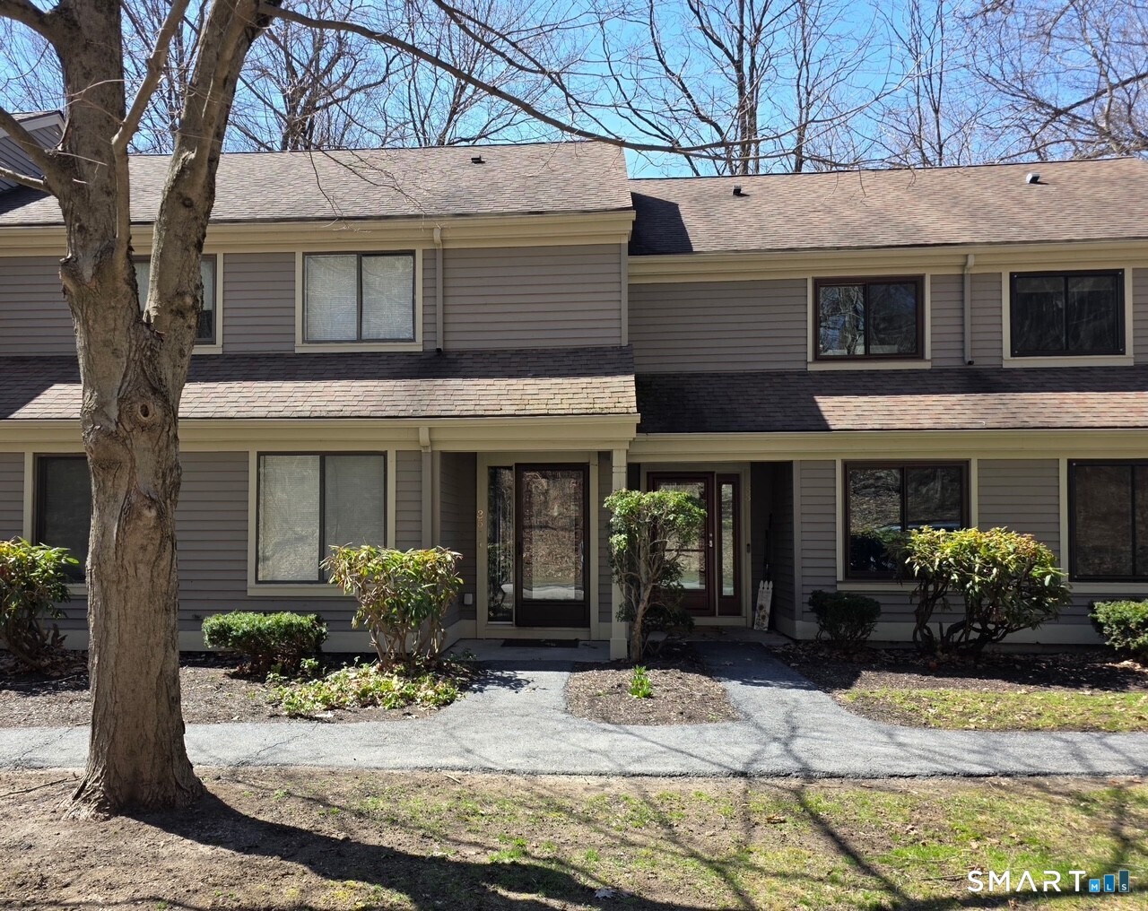 35 Riveredge Drive, Unit 35 Winsted, CT 06098 - Photo 2 of 33 a view of a house with potted plants